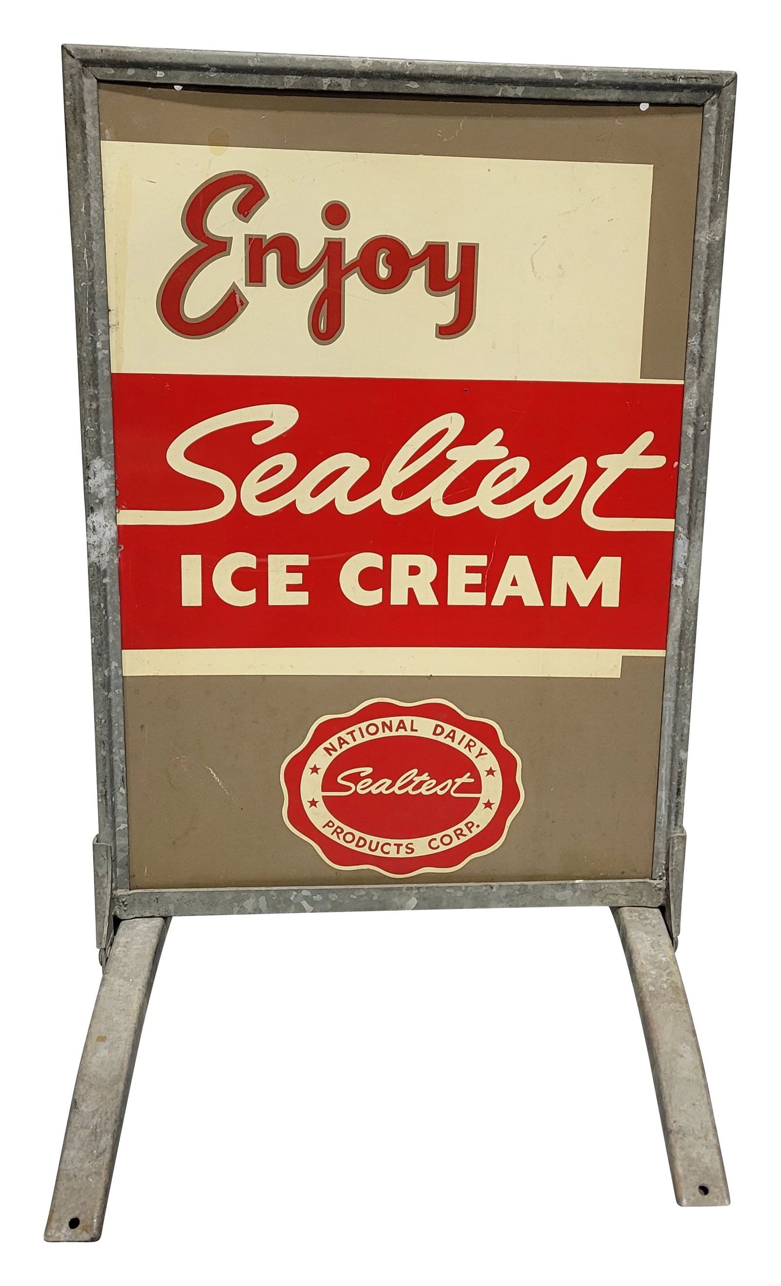 Enjoy Sealtest Ice Cream DST Sidewalk Sign: 20.5" x 23" x 31.5" double sided sign displays good color with moderate wear throughout each side including scratches, flaked paint, and small stains. The metal frame and stand have normal signs of we