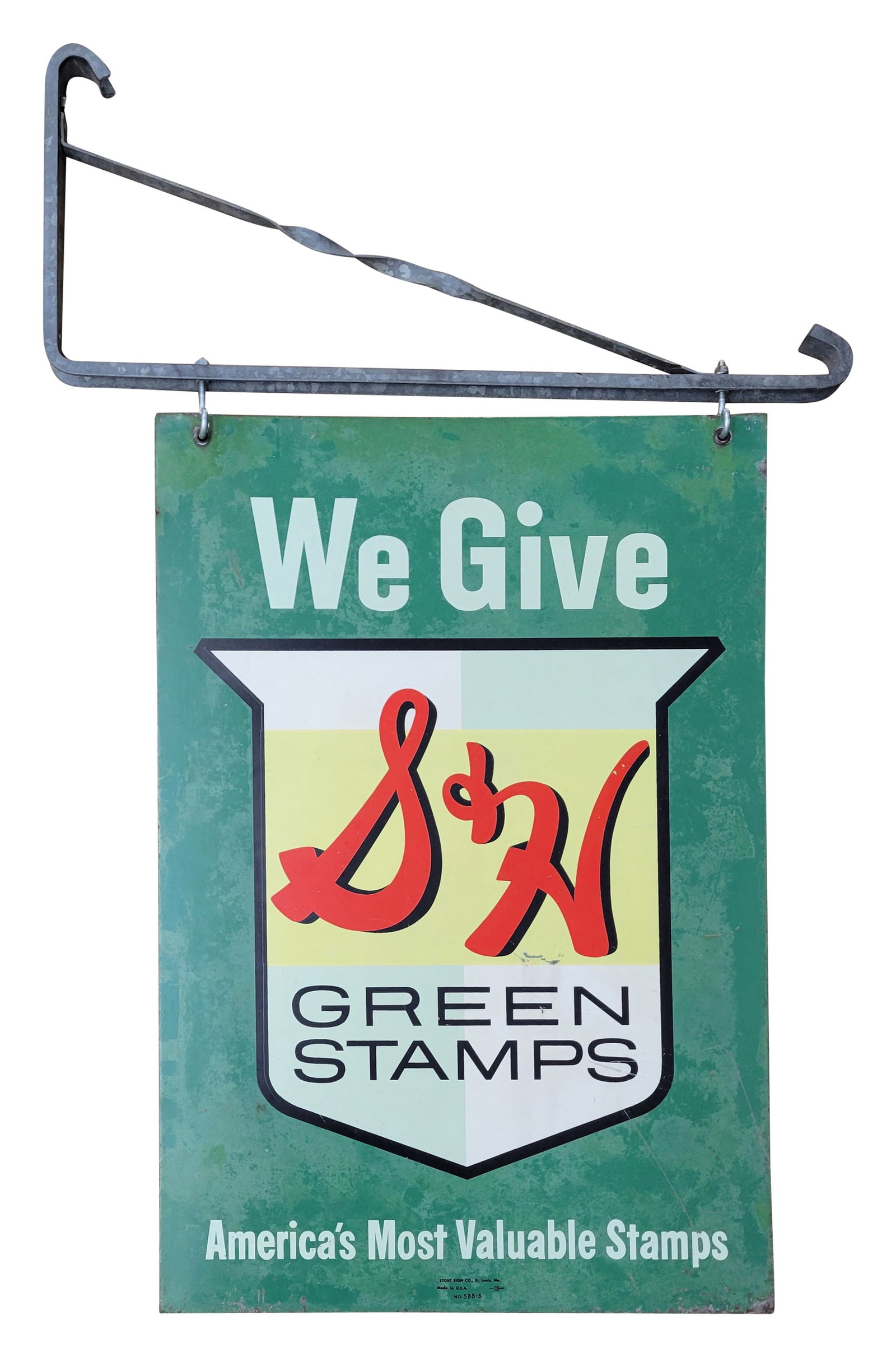 We Give S&H Stamps Double Sided Tin Sign With Bracket: 20" x 29.5" ( not including bracket) DST sign displays wear and age throughout on each side with scratches, fading, flaked paint on the perimeter, and small bends at the top mounting holes. The