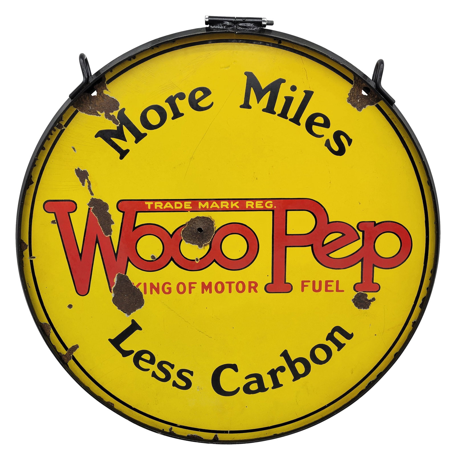 26" Woco Pep More Miles Less Carbon DSP Sign With Ring: 26" double sided porcelain sign is displayed within a new ring. The sign has a bullet hole in the center with porcelain loss and multiple large chips on each side. The upper edge has rust and small ar