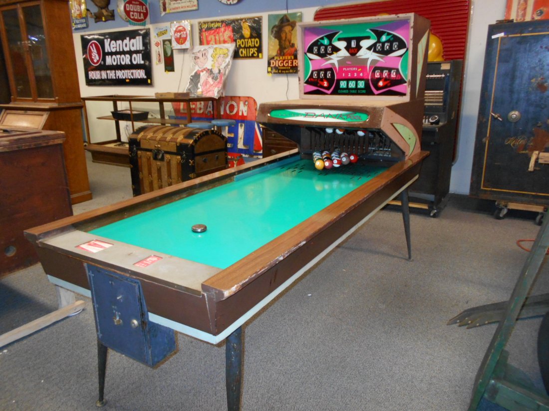 Rare United's Bank Pool Coin Operated Shuffle Game: Its like a shuffle bowling game but with pool. Rare game in great condition. 1964. Missing two rubber bumpers. Currently will not reset. Needs minor repair.