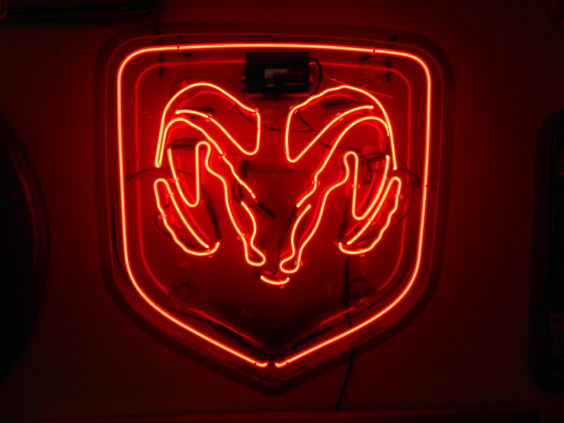 Ram Neon: WE DO NOT SHIP NEON. You must arrange for pick up within the time frame described in the auction terms. 29.5" x 31". Red neon in plastic frame.