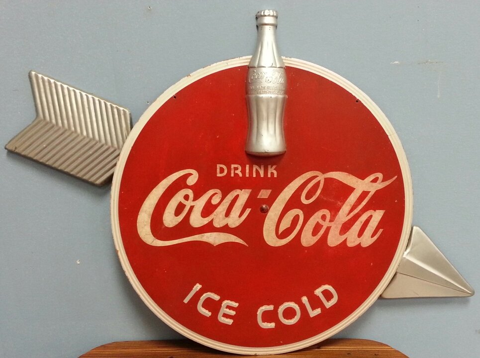 1930's Kay Display Coca Cola wood & metal Arrow Sign: A super 1930's wood and metal Coca Coca Kay Display arrow sign with bottle. The round coke sign is wood. The arrow and the bottle are aluminum. The Kay Display stamp is on the back of the sign. Great