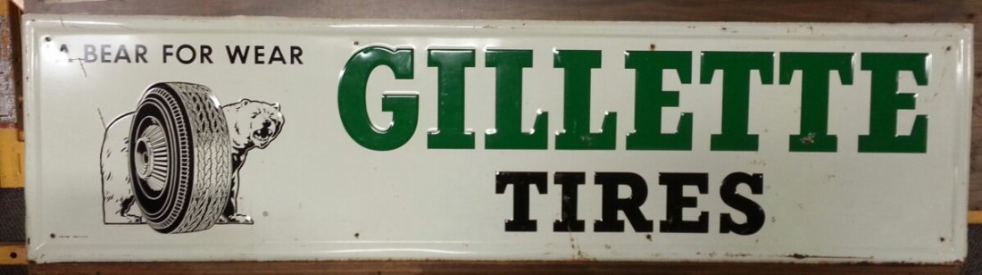 Gillette Tires advertising sign: 72"w x 19"h embossed Gillette Tires sign with "A Bear For Wear" slogan and logo.