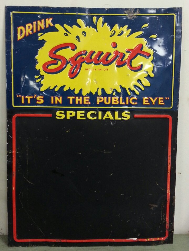 Squirt menu board: Original metal embossed Squirt menu board.
