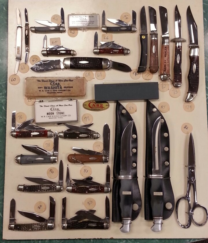 Case Knife collection of 23 new old stock pieces: 1970's Case knife collection of 22 knives and on pair of scissors. All items are new old stock from the 70's and still attached to the original display card. knives include single, two, three, and fou