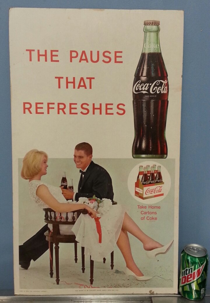 Coca Cola cardboard sign: 16\"w x 27\"h Original cardboard with picture of guy and girl enjoying a Coke.