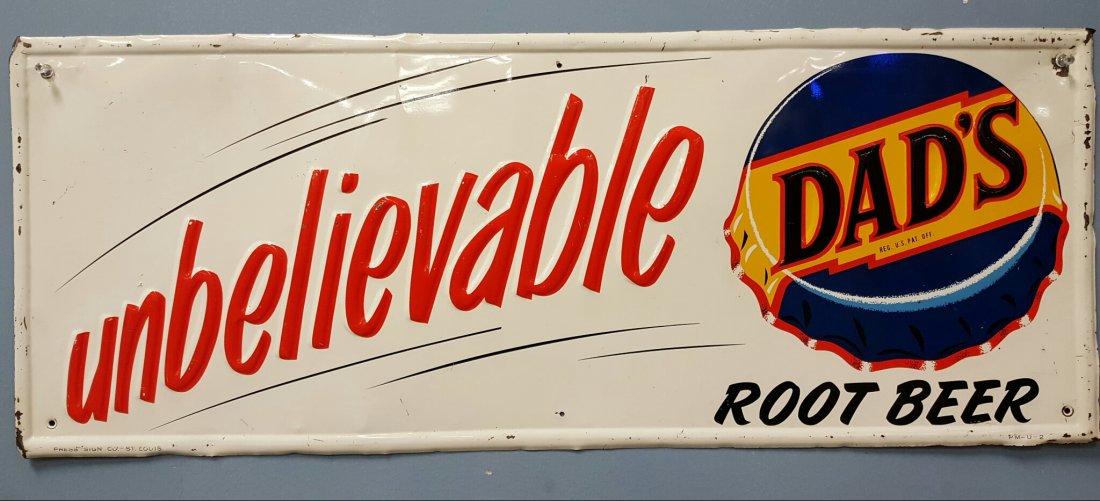Scarce Dad's Root Beer Advertising Sign: 31"w x 12"h Embossed "unbelievable" Dad's Root Beer Sign. Made by Press Sign Co.