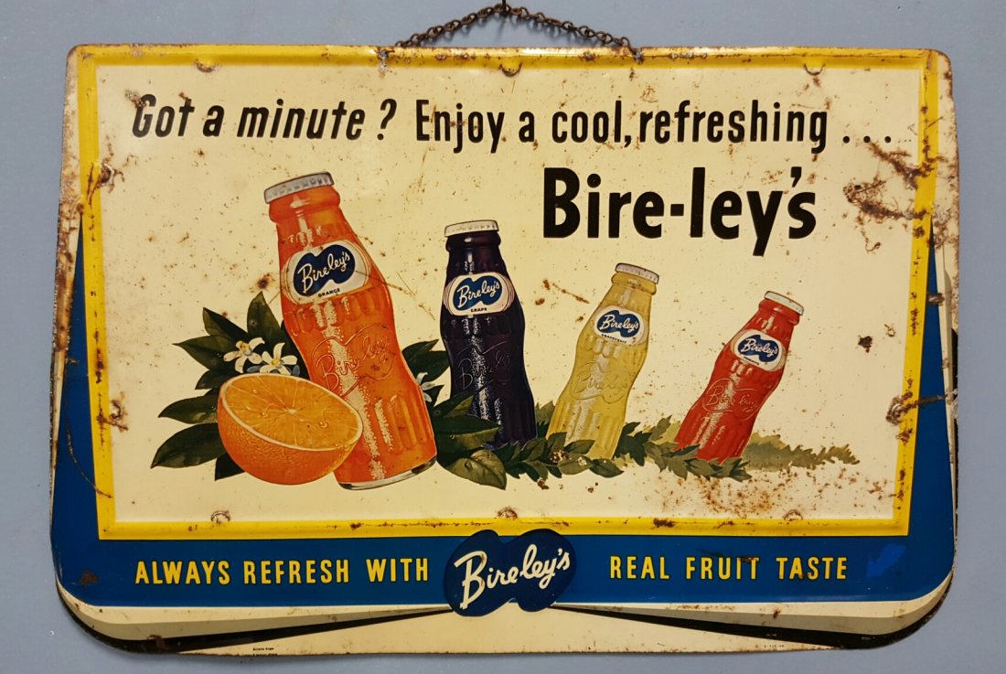 Bire-leys Advertising Sign: 19"w x 13"h embossed metal sign showing four different flavors of Bire-leys bottles
