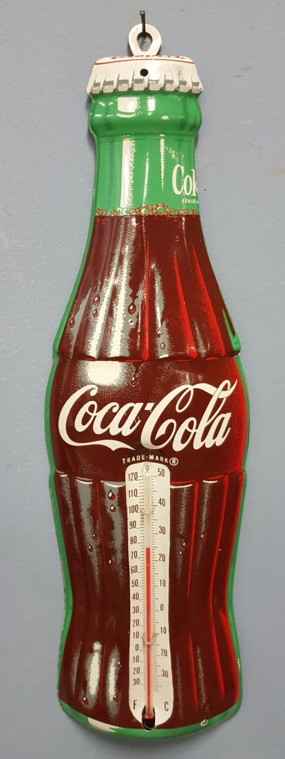 NOs 1960's Coca Cola Tin Bottle Thermometer: 17"h New old stock die cut Coca Coca bottle with thermometer. Donasco made in U.S.A. on bottom