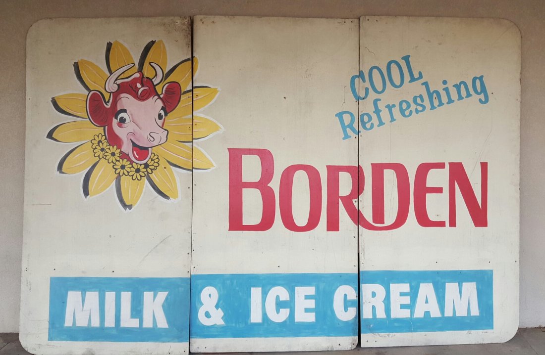 Borden Ice Cream Billboard Movie Prop: 3 painted plywood panels each measuring 4ft wide by 8ft high totaling 12ft wide. The billboard features Elsie the Cow Graphics and was used as a movie prop. The consignor is not certain but thinks is 