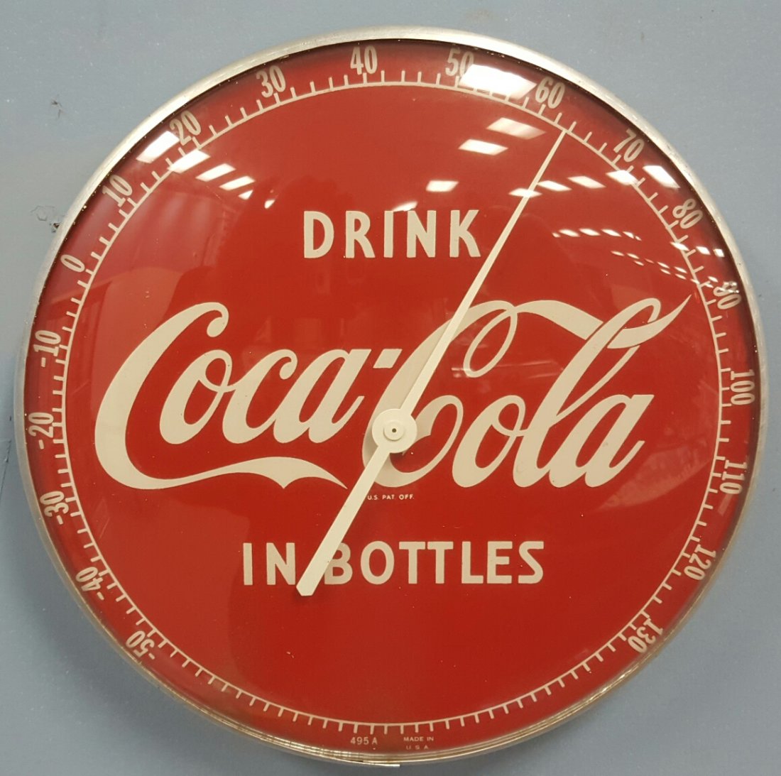 Drink Coca Cola In Bottles Thermometer: Round with glass front Coca Cola thermometer.