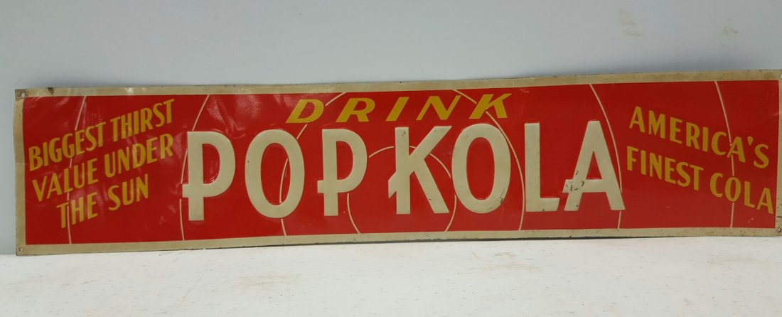 Drink Pop Kola Early Vintage Tin Advertising Sign: 13 3/4"w x 3"h embossed tin sign with minor scuffs and bends.