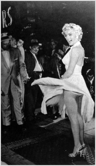 Marilyn Monroe Press Shoot #1 Photo by Sam Shaw: Description of image: Marilyn Monroe at a press shoot and on location for "The Seven Year Itch", at 52nd and Lexington Avenue, New York City, September 15, 1954. Photographers swarmed this event to ge