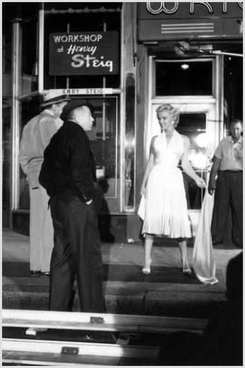 Marilyn Monroe, Wilder and Ewell Photo by Sam Sha: Description of image: Marilyn Monroe, Billy Wilder and Tom Ewell on location at 51st and Lexington, New York City, 1954. Sam Shaw took photos as Billy Wilder, Director of "The Seven Year Itch", was su