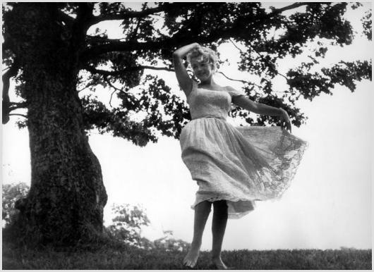 Marilyn Monroe Barefoot and Dancing, Roxbury, CT: Description of image: Sam Shaw took several photos of Marilyn one day as she danced freely and happily while barefoot on the 350 acre farm in Roxbury, CT, c. 1957. Sam had a way of bringing out the be
