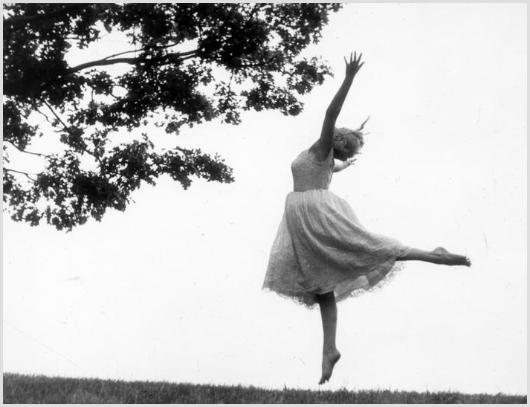 Marilyn Monroe Barefoot and Dancing, Roxbury #2: Description of image: Sam Shaw took several photos of Marilyn one day as she danced freely and happily while barefoot on the 350 acre farm in Roxbury, CT, c. 1957. Sam had a way of bringing out the be