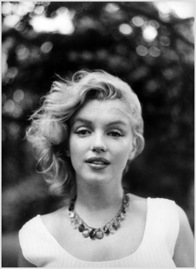 Marilyn Monroe in Amber Necklace, Roxbury #2 Shaw: Description of image: Marilyn Monroe on the 350 acre farm where she vacationed with Arthur Miller, Roxbury, CT, c. 1957. Sam Shaw liked to photograph Marilyn up-close to capture her incredible eyes an