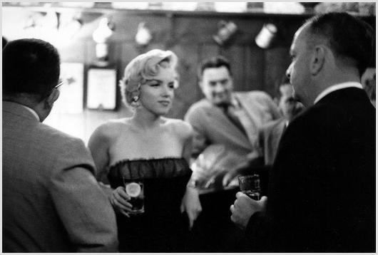 Marilyn Monroe at the '21 Club', NYC Sam Shaw Pho: Description of image: Marilyn Monroe leaning against the bar at the '21 Club', New York City, 1955. Marilyn was attending a dinner at the famous 21 Club on 52nd Street in Manhattan after an evening at