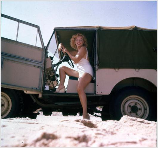 Marilyn Monroe in Her Range Rover, Amagansett, NY: Description of image: Marilyn Monroe sitting in her Land Rover on the beach near Amagansett village located at the tip of Long Island, New York, c. 1957. Sam Shaw accompanied Marilyn and her husband,
