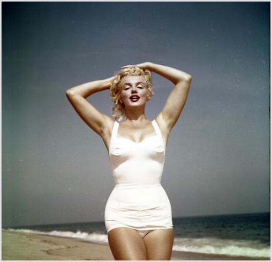 Marilyn Monroe on the Beach, Easthampton #1: Description of image: Marilyn Monroe projecting a sultry pose for Sam Shaw, while enjoying the beach in Easthampton, near her summer house in Amagansett, NY, 1957. Because Marilyn Monroe was born in C