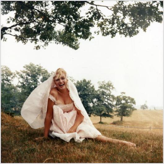 Marilyn Monroe Barefoot in White Lace #1 Sam Shaw: Description of image: Sam Shaw took several photos of Marilyn one day as she danced freely and happily while barefoot on the 350 acre farm in Roxbury, CT, c. 1957. Just at the moment Marilyn had spun