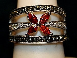 Beautiful Multi Colored Sterling Silver Ring. (557L): Beautiful Multi Colored Sterling Silver Ring. (557L) Goldish Red Sapphires, Topaz & Black Diamonds twt approx. 5cts.