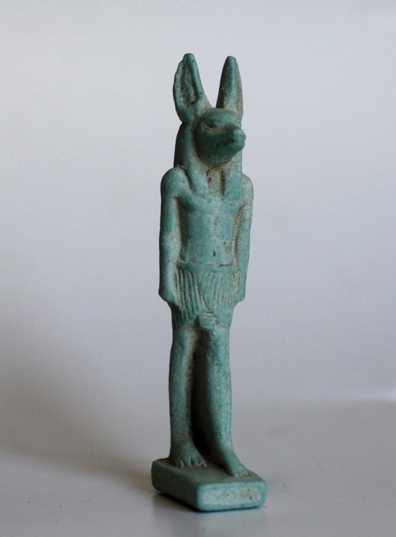 Ancient Egyptian Faience Amulet of Anubis: Ancient Egyptian Faience Amulet of Anubis . Period: 1000 BC to 664 BC Material: Faience Category: Egyptian Art Dimensions: 3.7" (9.5 cm) H Condition: Excellent.