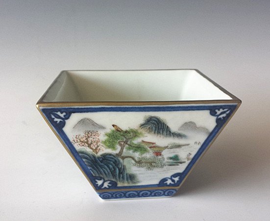 CHINESE FAMILLE ROSE SQUARE PORCELAIN BRUSH WASHER WITH: An unusual Chinese Famille Rose square porcelain brush washer,finely painted with landscape on each side, Qianlong mark on the bottom. 3 3/4" x 3 3/4" x 2 1/2" H.