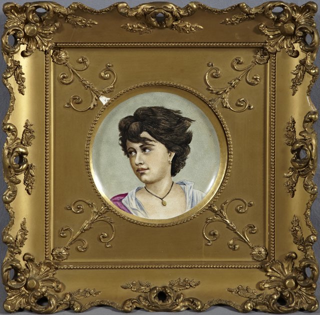 Continental School, "Portrait Plate of a Raven Haired: Continental School, "Portrait Plate of a Raven Haired Beauty," late 19th c., in a period gilt and gesso frame, Dia.- 9 1/2 in.