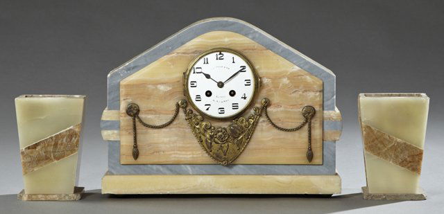 Art Deco Three Piece Alabaster and Marble Clock Set, c.: Art Deco Three Piece Alabaster and Marble Clock Set, c. 1930, the arched clock with an enamel dial painted "L'Etoile d'Or, Clichy 78, Rue de Paris," over an applied relief garland and floral drape, ti