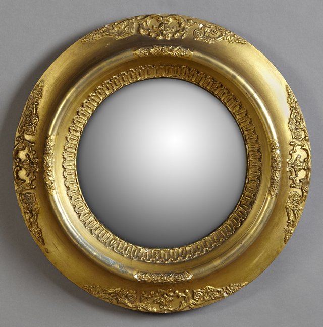 Victorian Gilt and Gesso Convex Mirror, 19th c., with a: Victorian Gilt and Gesso Convex Mirror, 19th c., with a wide circular foliate decorated concave frame, D.- 4 in., Dia.- 19 1/2 in.