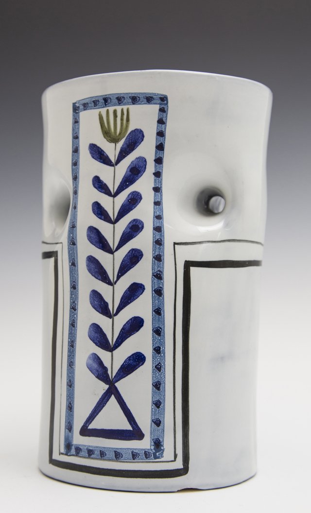 Roger Capron (1922-2006), Oval Glazed Ceramic Vase, by: Roger Capron (1922-2006), Oval Glazed Ceramic Vase, by Vallauris, signed on the underside, the pierced sides with blue floral decoration, H.- 7 in., W.- 4 1/2 in., D.- 3 3/4 in.