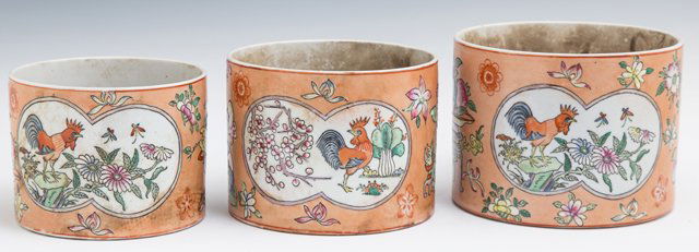 Group of Three Oriental Style Nesting Circular: Group of Three Oriental Style Nesting Circular Porcelain Glazed Bowls, 20th c., with rooster and floral decoration, on a melon ground, Largest- H.- 4 1/2 in., Dia.- 6 in.