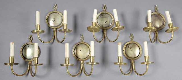 Group of Six Brass Two Light Sconces, 20th c., with: Group of Six Brass Two Light Sconces, 20th c., with convex mirror back plates issuing the two scrolled arms, H.- 10 5/8 in., W.- 9 1/4 in., D.- 5 3/8 in.
