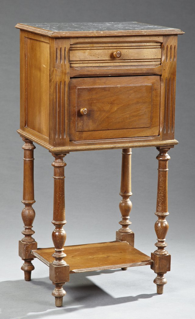 French Henri II Style Carved Walnut Marble Top: French Henri II Style Carved Walnut Marble Top Nightstand, 19th c., the inset highly figured grey marble over a frieze drawer above a cupboard door on ring turned tapered legs to French toes joined by