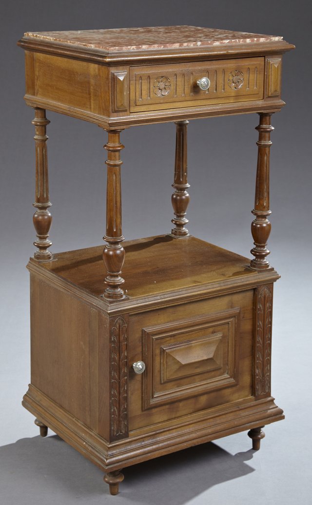 French Henri II Style Carved Mahogany Marble Top: French Henri II Style Carved Mahogany Marble Top Nightstand, 19th c., the highly figured inset rouge marble over a frieze drawer, on tapered ring turned supports above an open shelf, over a cupboard d