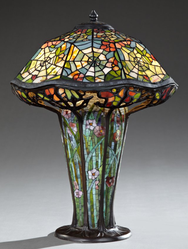 Tiffany Style Leaded Glass "Cobweb" Lamp Shade, late: Tiffany Style Leaded Glass "Cobweb" Lamp Shade, late 20th c., on a bronze patinated baluster mosaic tile mounted base with leaded glass supports, H.- 23 in., Dia.- 17 1/2 in.