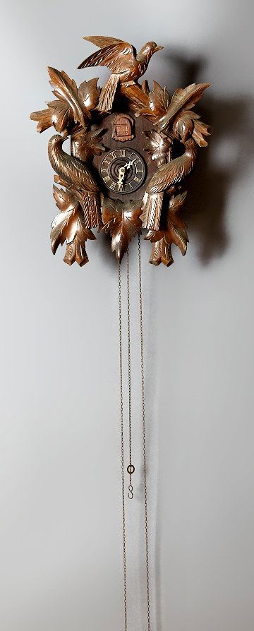 Two German Cuckoo Clocks, 20th c., with weights, (1 of 2)