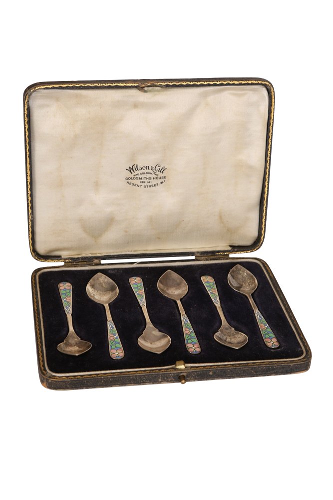 A set of six Art Deco silver and enamel coffee spoons: A set of six Art Deco silver and enamel coffee spoons, Bernard Instone, Birmingham 1928, each with petal-shaped bowl, the stems enamelled with stylised foliage, in a Wilson & Gill fitted case.