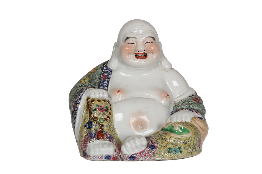A Chinese porcelain model of a seated Buddha: A Chinese porcelain model of a seated Buddha, in typical pose holding prayer beads and laughing, decorated with coloured enamels. 24cm