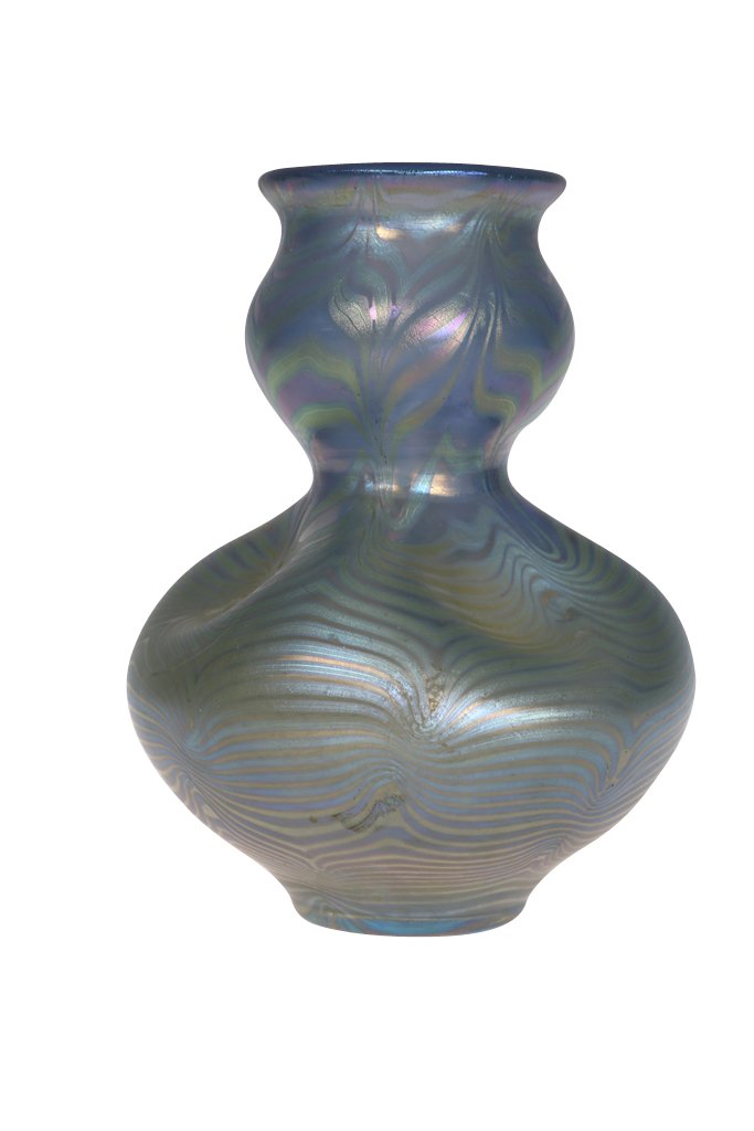 Loetz iridescent glass vase: Loetz, a signed iridescent glass vase, of bulbous form with dimples, decorated with tonal loops on a blue ground, etched Loetz Austria. 13.5cm