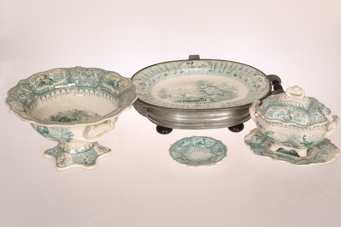 A SMALL COLLECTION OF MIDDLESBROUGH POTTERY, comprising: A SMALL COLLECTION OF MIDDLESBROUGH POTTERY, comprising a pewter and pottery heated meat dish, pedestal bowl, sauce tureen with stand and cover, and a saucer; all green transfer printed with the ''Cal