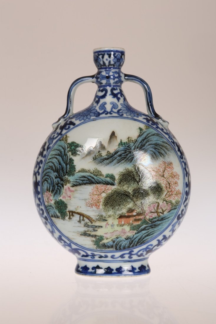 A SMALL CHINESE FAMILLE ROSE MOON FLASK, with twin: A SMALL CHINESE FAMILLE ROSE MOON FLASK, with twin handles, painted with opposing landscape vignettes. 17cm high