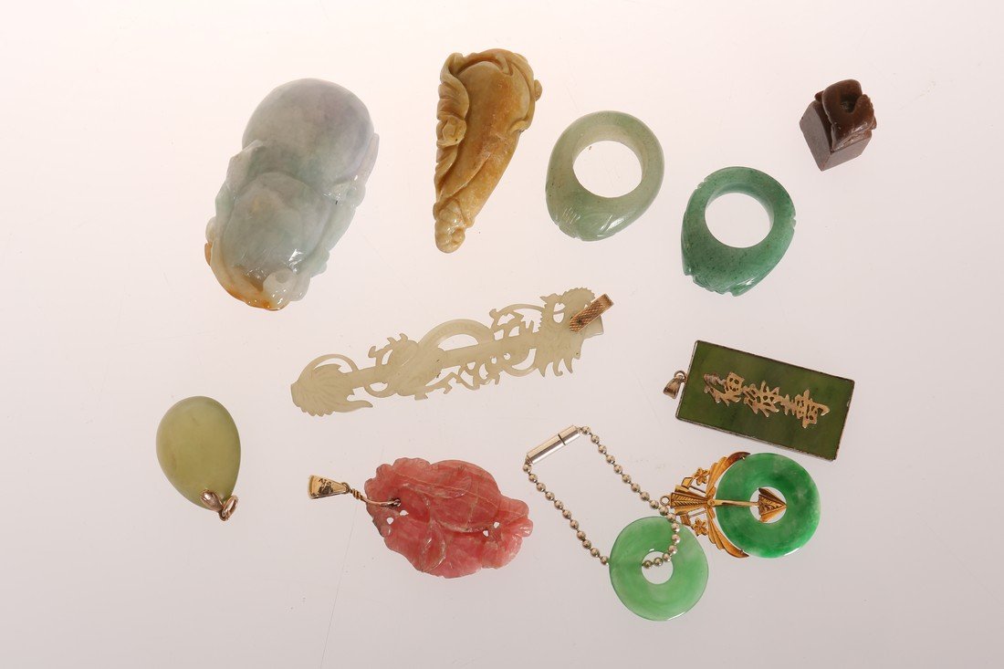 A SMALL COLLECTION OF CHINESE JEWELLERY AND OBJECTS,: A SMALL COLLECTION OF CHINESE JEWELLERY AND OBJECTS, including a jadeite scroll weight, two rings, pendants, etc. (11)