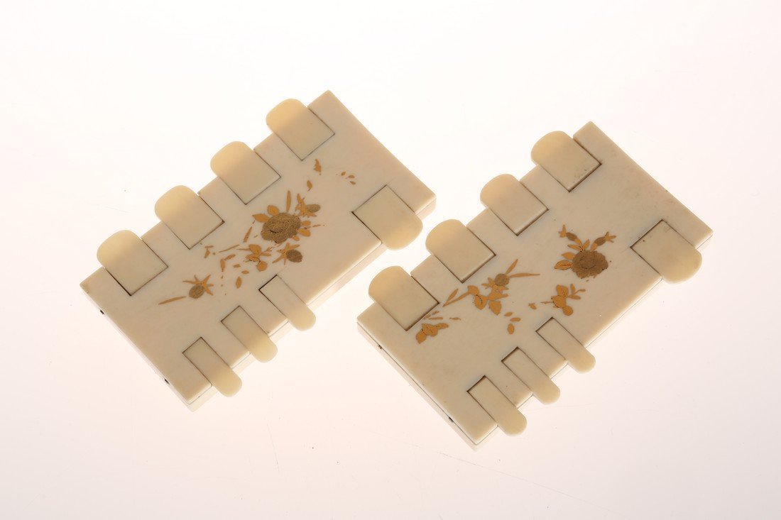 A PAIR OF JAPANESE MEIJI PERIOD IVORY WHIST MARKERS, of: A PAIR OF JAPANESE MEIJI PERIOD IVORY WHIST MARKERS, of characteristic form with gilded decoration of insects amidst foliage. 9.3cm by 6cm