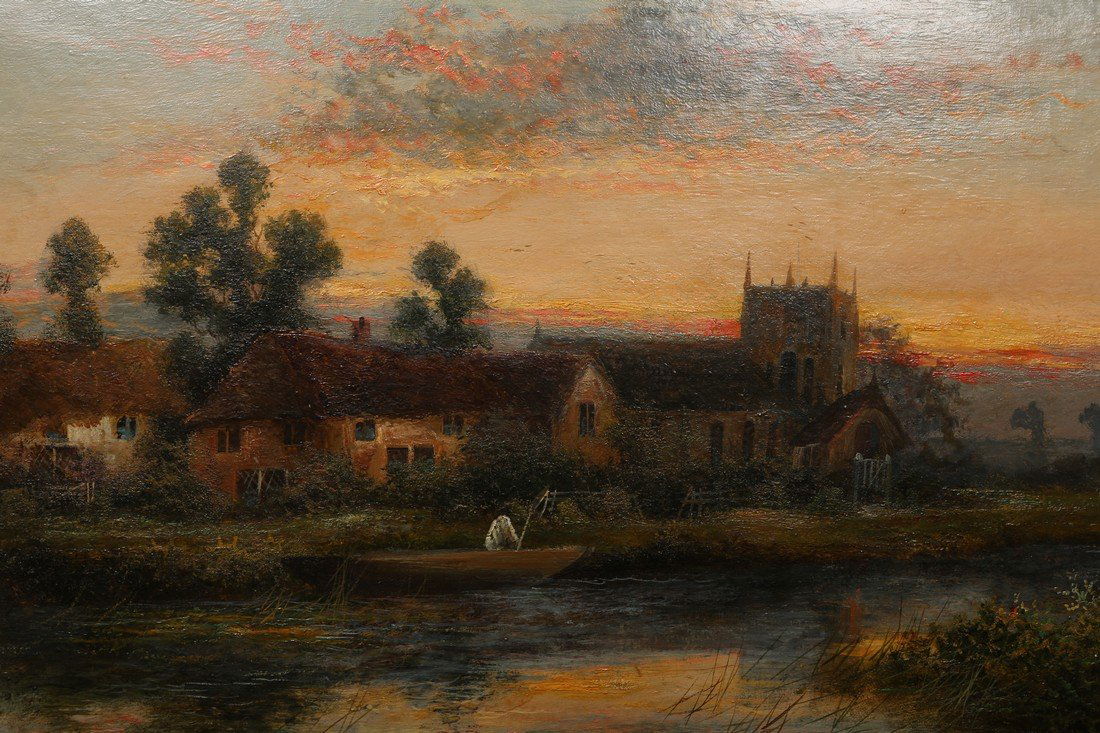 WILLIAM LANGLEY (1852-1922), FIGURE IN A BOAT MOORED BY: WILLIAM LANGLEY (1852-1922), FIGURE IN A BOAT MOORED BY A CHURCH AT SUNSET, signed William Langley lower left, oil on canvas, framed. 41cm by 61cm