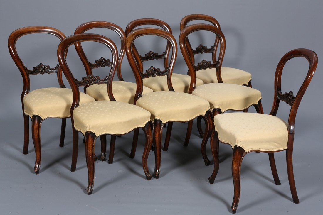 ARTHUR JONES & SON, DUBLIN A SET OF EIGHT IRISH: ARTHUR JONES & SON, DUBLIN A SET OF EIGHT IRISH ROSEWOOD BALLOON BACK CHAIRS, 19TH CENTURY, each with pierced rail, raised on cabriole legs, stamped.