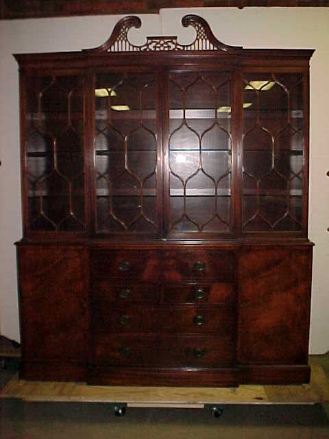 Mahogany 4 door Breakfront bookcase w/desk.