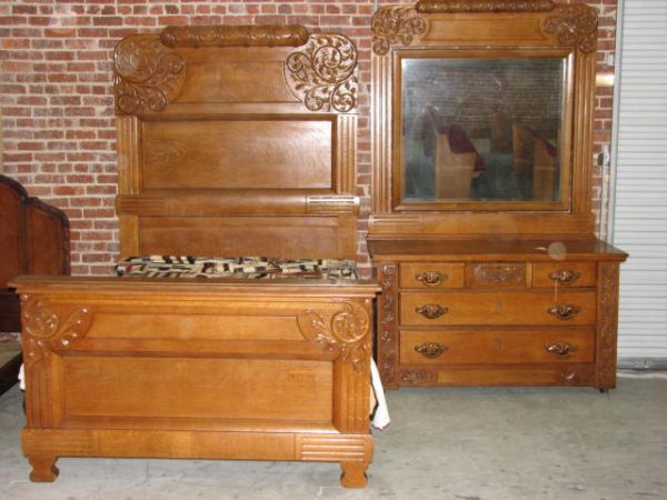 American oak 2 piece Bedroom suite. Bed & Dresser: American oak 2 piece Bedroom suite. Bed & Dresser. Set has been professionaly refinished. Massive carved quartersawn oak. Very solid & sturdy. Bed measures 87"t x 63"w, dresser 93"t x 58"w. Very heavy