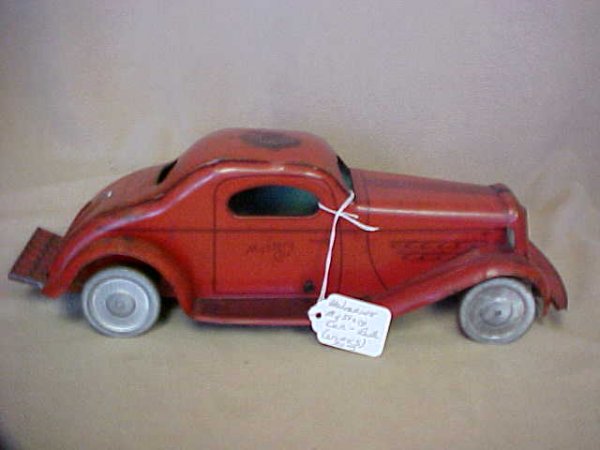 Wolverine Mystery car wind up working condition.: Wolverine Mystery car wind up working condition. Original paint w/good graphic's. Works great. Measures 13"long x 4-1/2"tall x 4-1/2"deep.